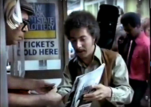 Dustin Hoffman tries to get a copy of Time Magazine on credit